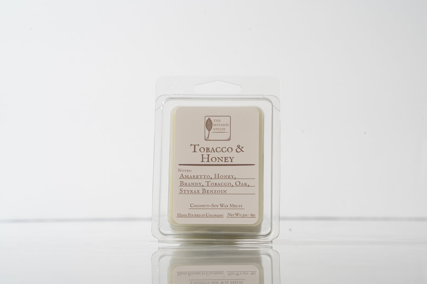 Tobacco & Honey wax melt packaging on a white background